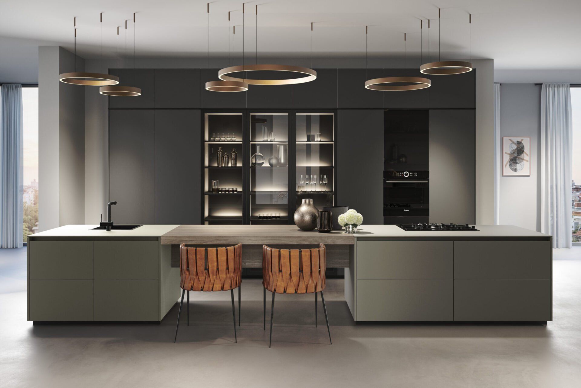 Een keuken met een groot kookeiland en twee stoelen