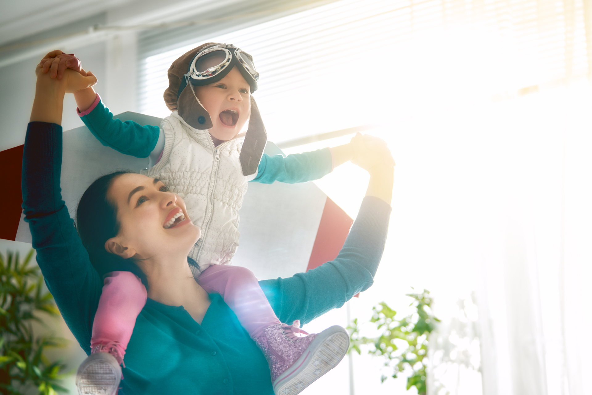 Being fully informed about ADHD and autism symptoms, a mother patiently plays with her child to support their development.