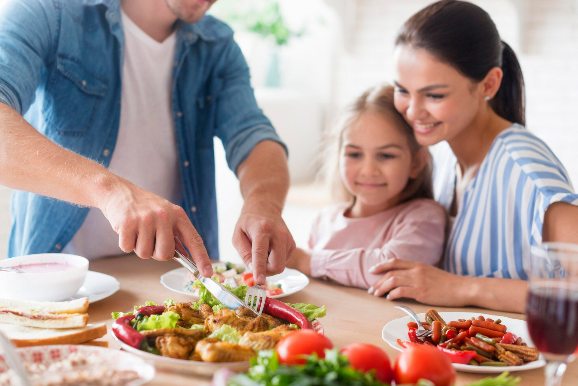 Parents prepare a meal with professionally recommended child diet improvement plan.