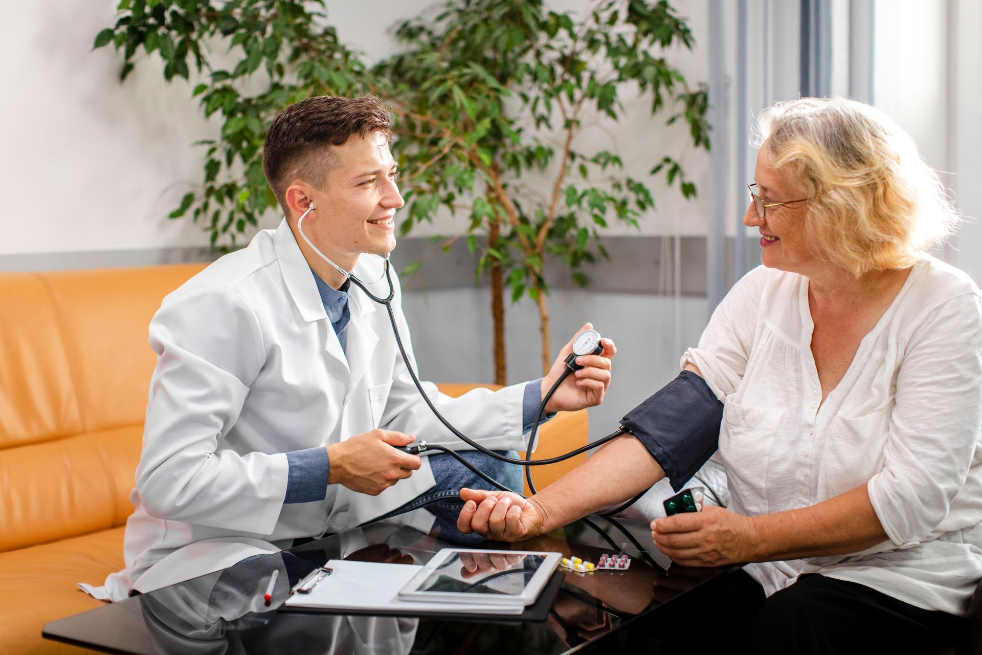 A doctor provides personalized high blood pressure treatment tips to their patient.