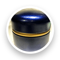 Blue and gold lidded container. Cylindrical body, with a shiny, blue lid. Gold ring at the lid's base.