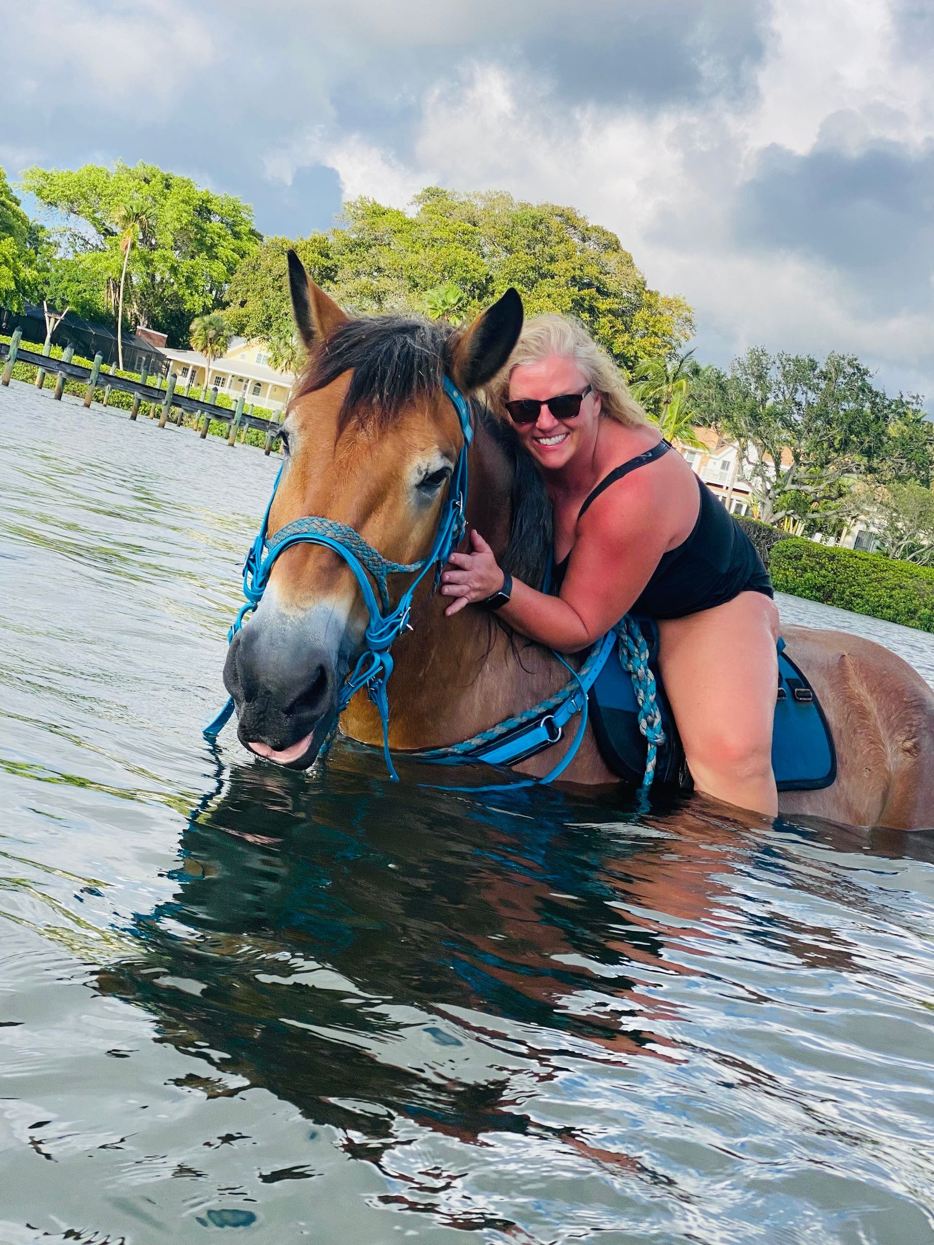 father son enjoy riding horses together