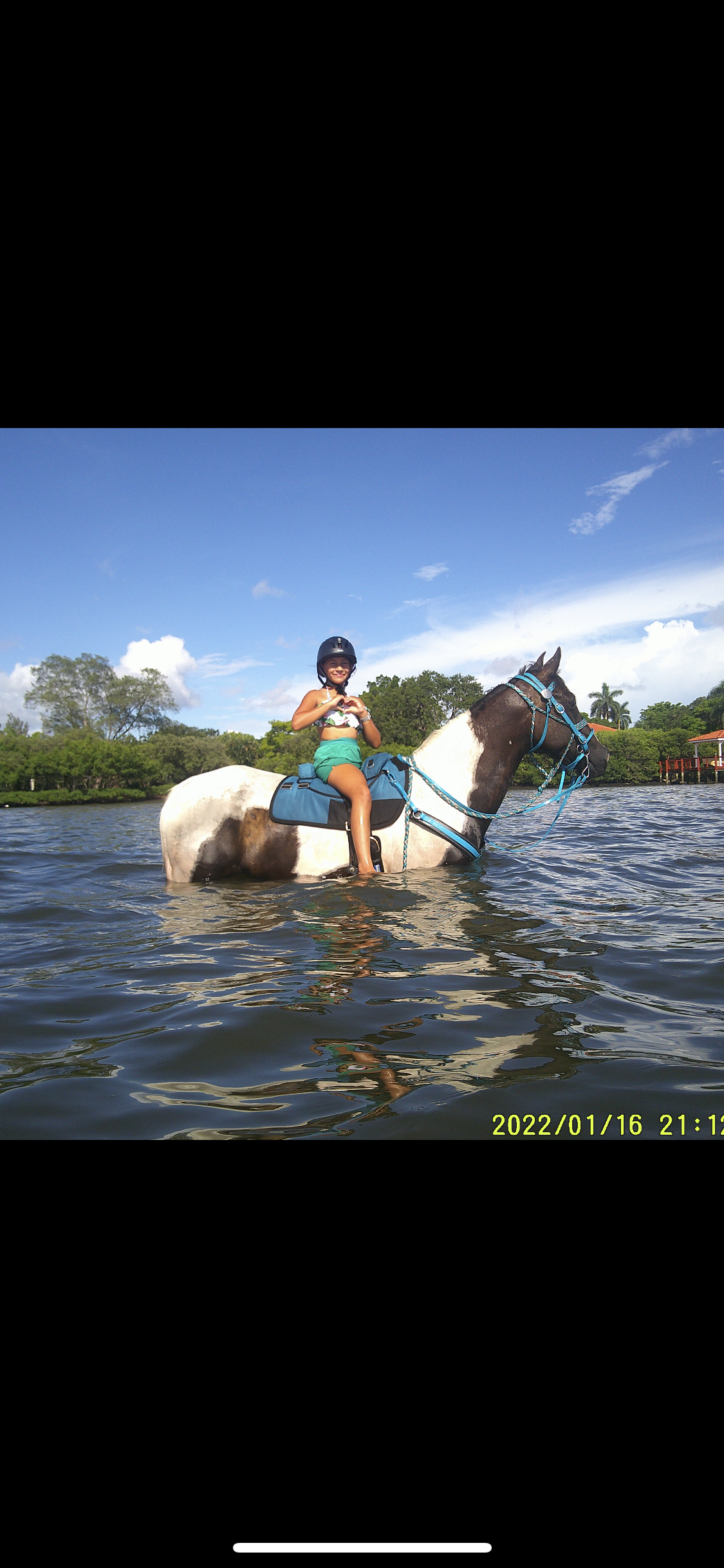 horse riding on beach sunset