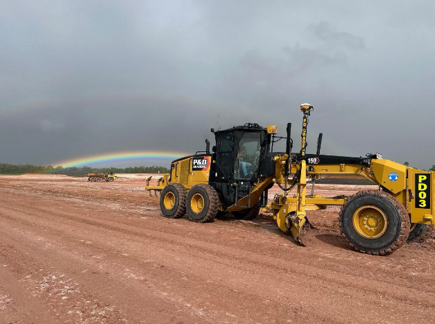 Women Sitting In Class with Paperwork in Construction Uniforms — JTM Projects Australia Pty Ltd in Hollywell, QLD