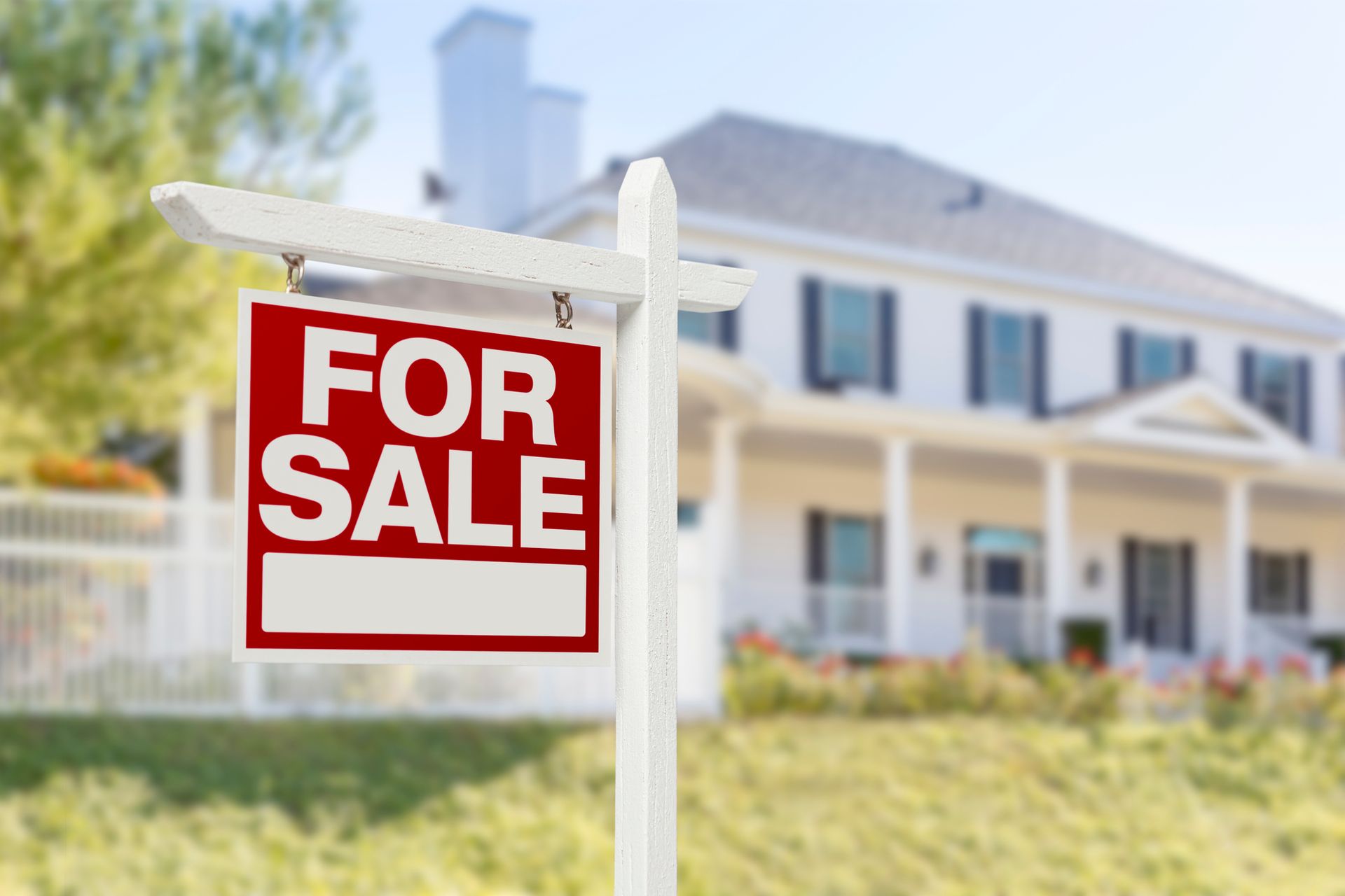 A for sale sign is in front of a house - Livingston County, MI - Cindy Perks, The Perks of Real Estate