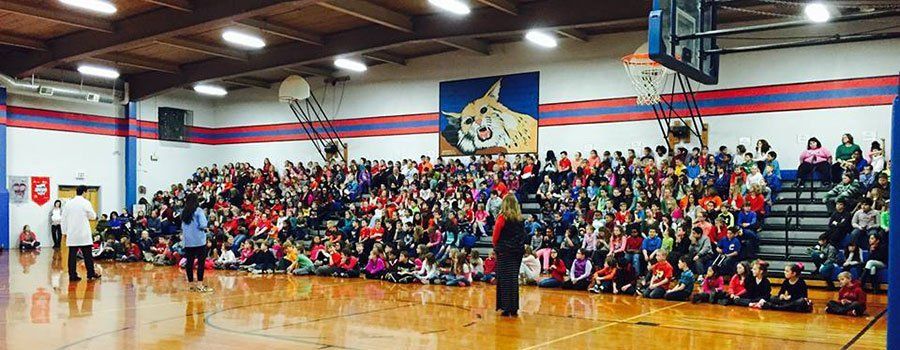 Dentist Dr. Moody at Woodland Elementary School in Edwardsville school assembly