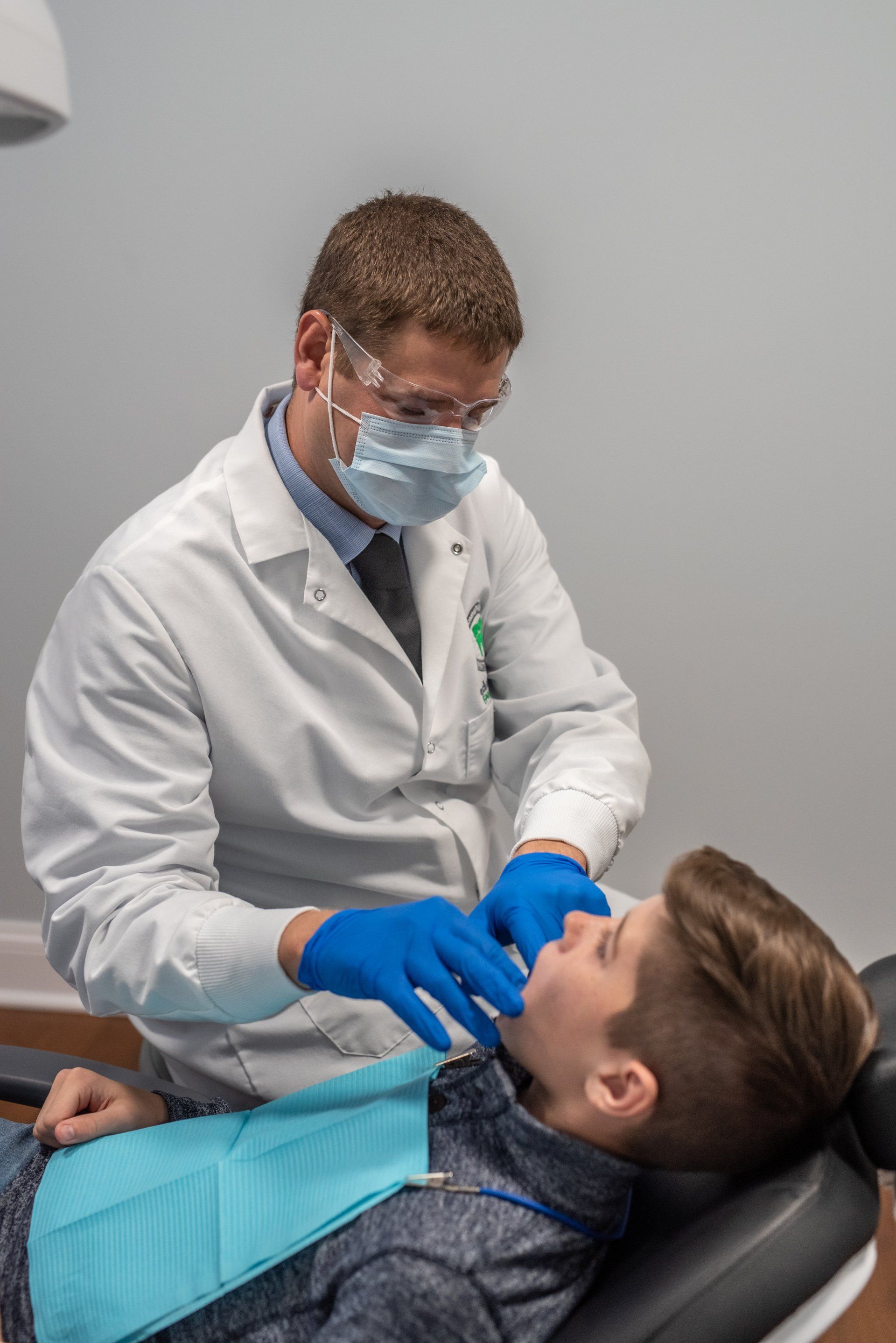 Dr. Beau Moody performing a dental exam