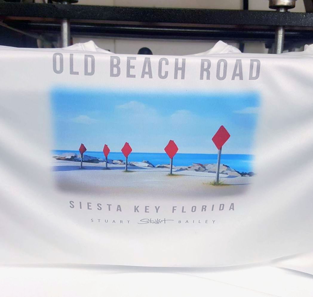 A white t-shirt with the words old beach road on it
