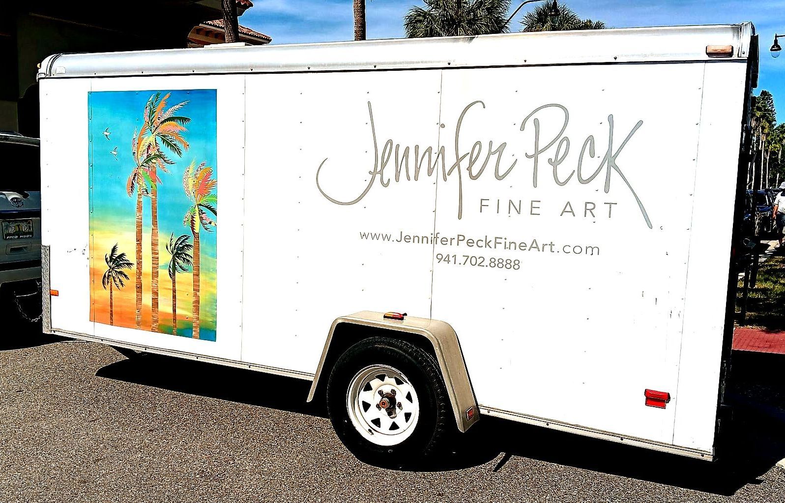 A white trailer with the name jennifer peck on it