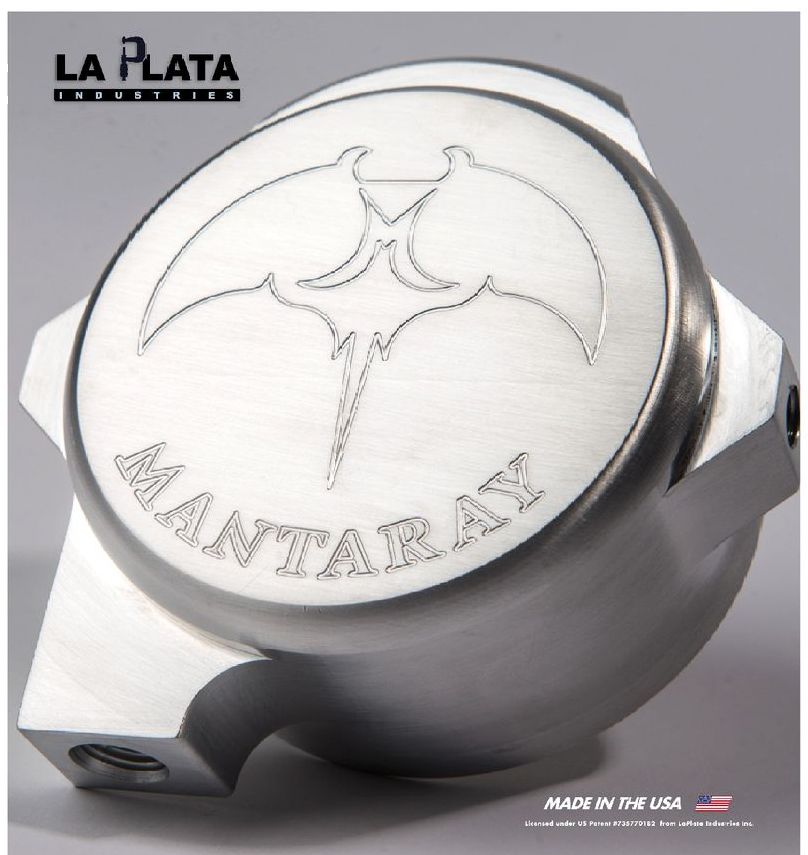 A silver item that says manta ray on it