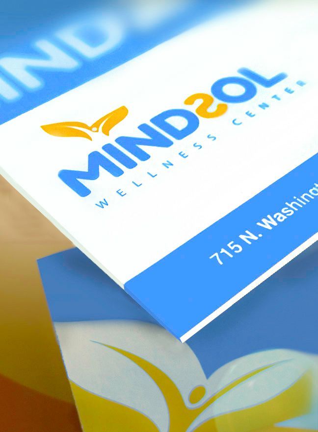 A blue and white business card for mindsol wellness center