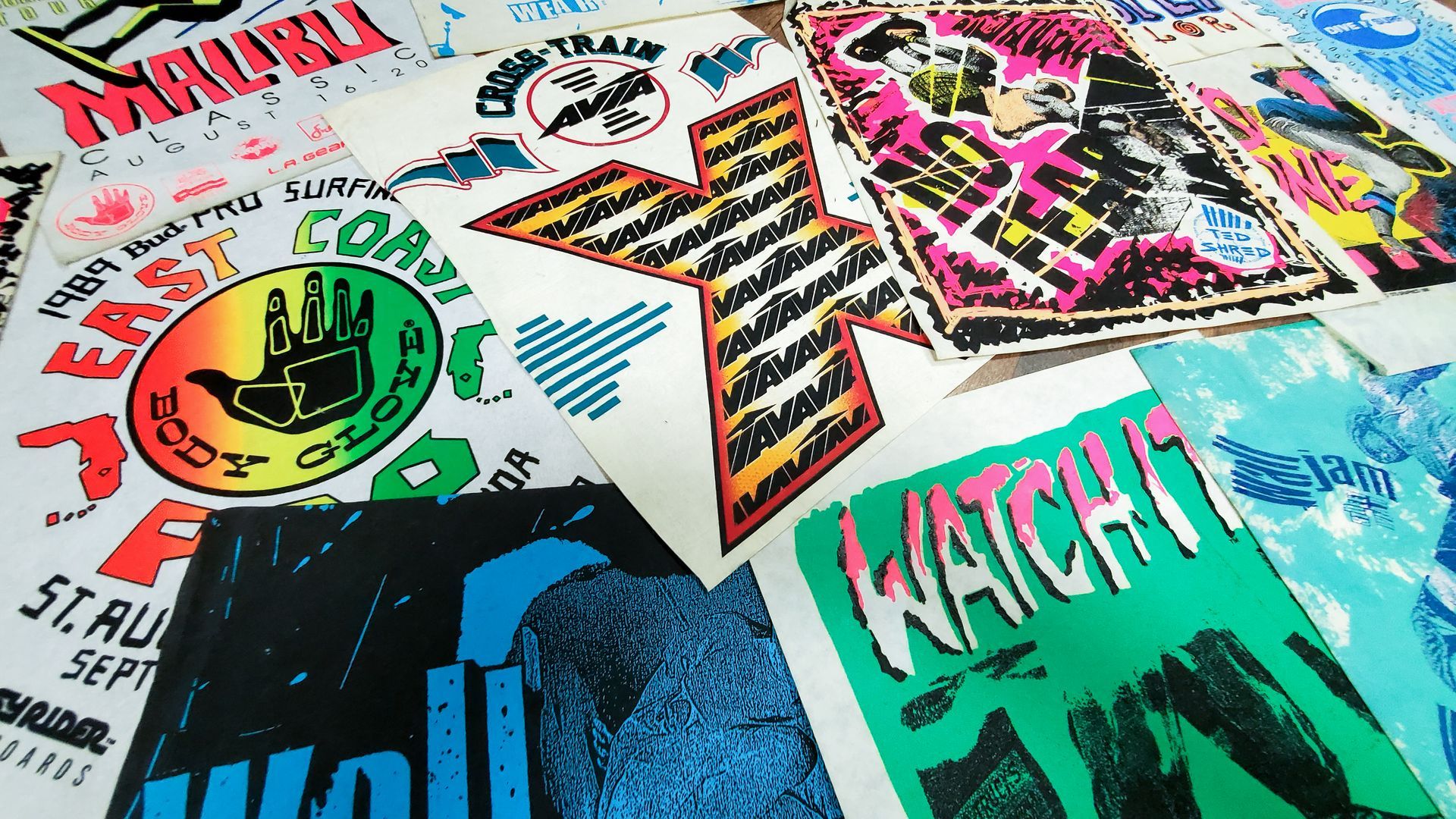 A bunch of t-shirts with one that says catch it