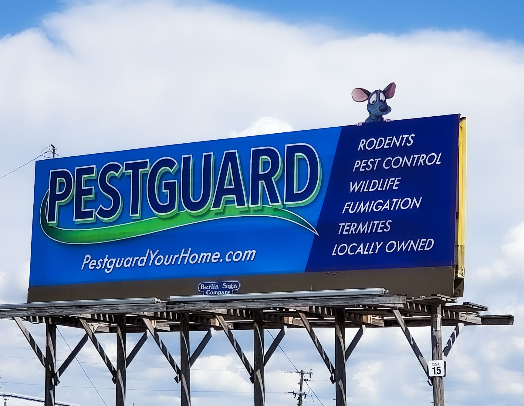 A billboard by Stu-Art for pestguard with a mouse on top