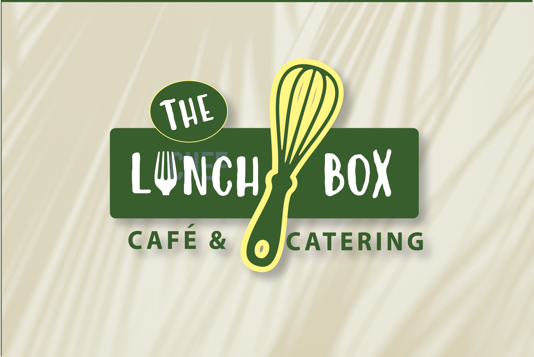 A logo for the lunch box cafe and catering