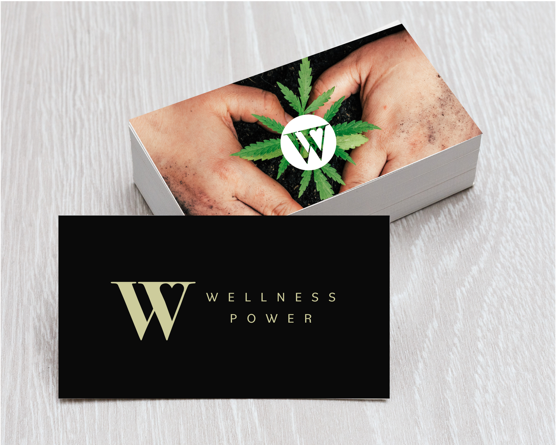 A stack of business cards for wellness power