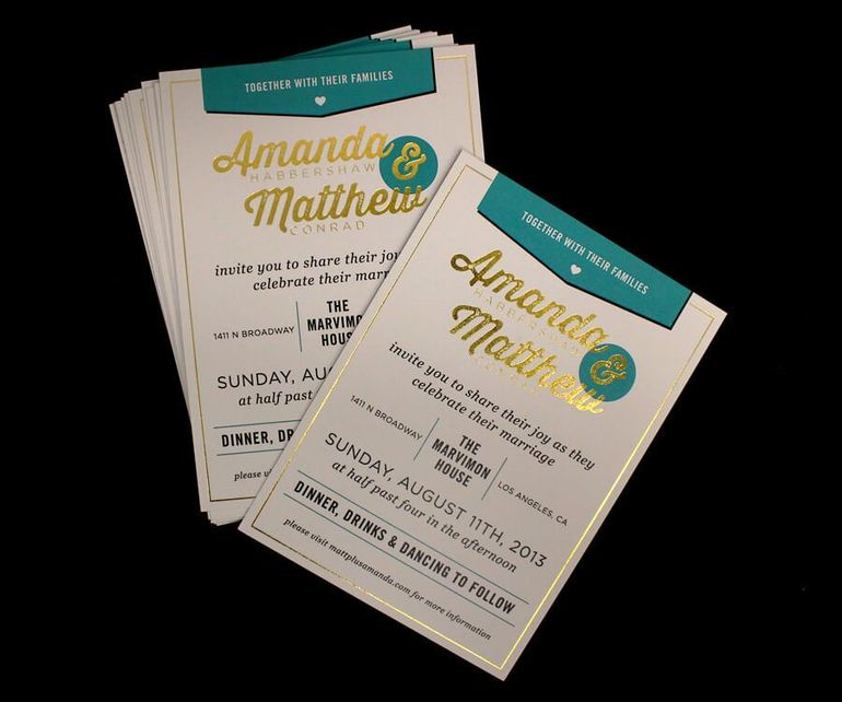 A stack of wedding invitations for amanda and matthew