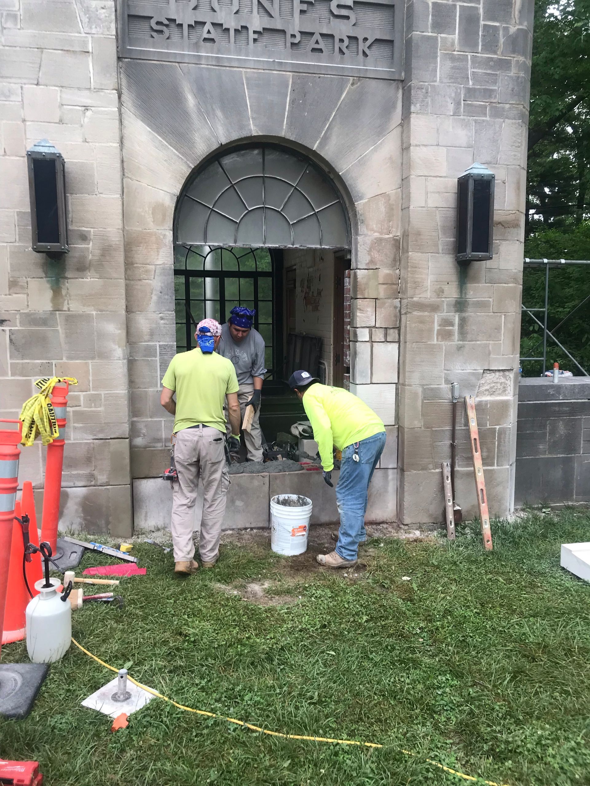 A group of construction workers are working on the pavillion at Indiana Dunes.