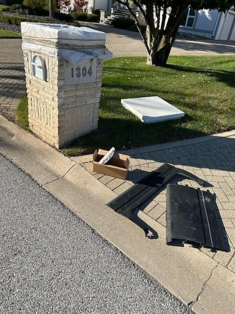 A brick mailbox with the number 1304 on it