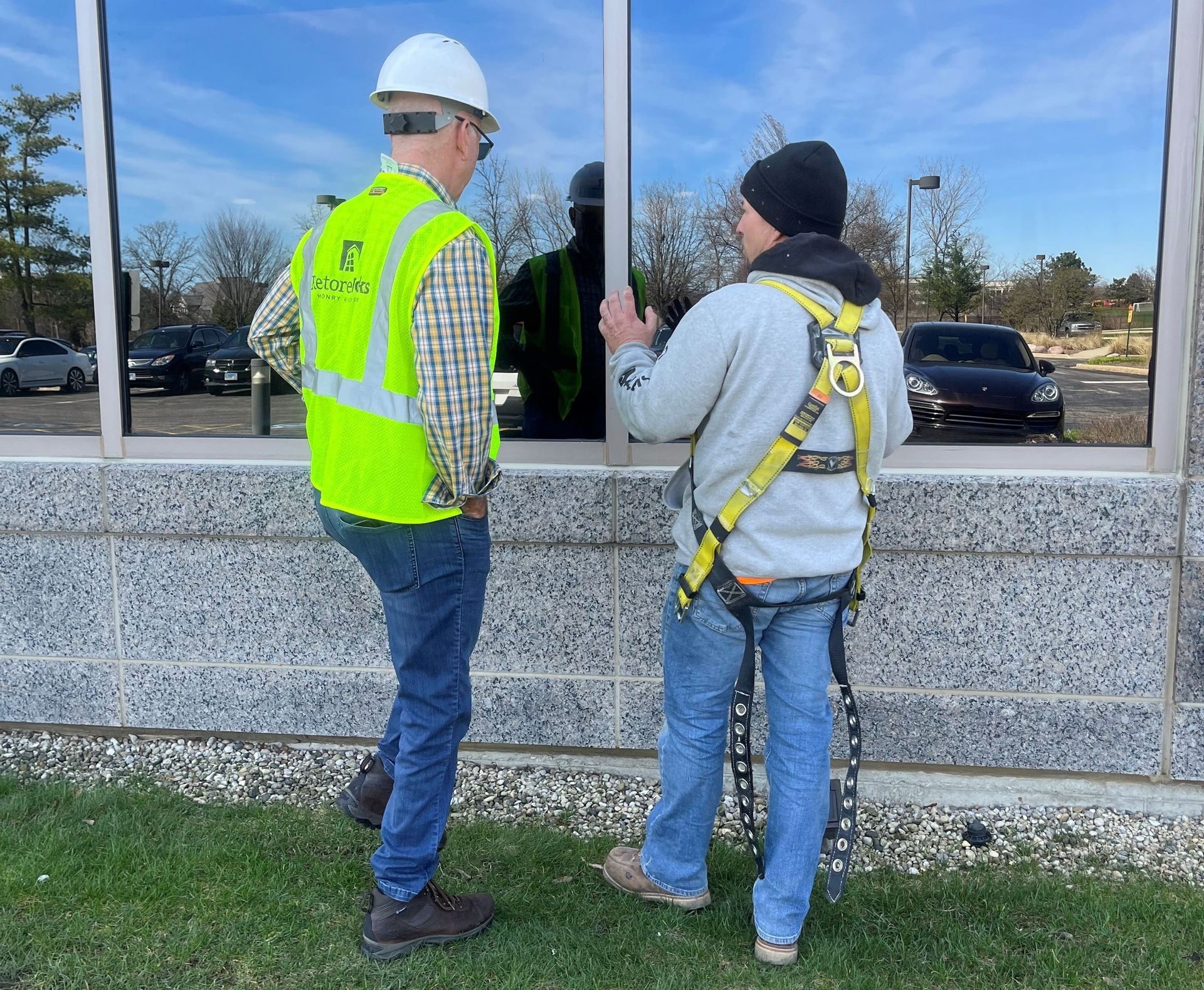 RestoreWorks conducting a site assessment at the College of American Pathologists in Northfield, Illinois, evaluating joint failure, UV damage, and air infiltration prior to sealant replacement and envelope restoration.