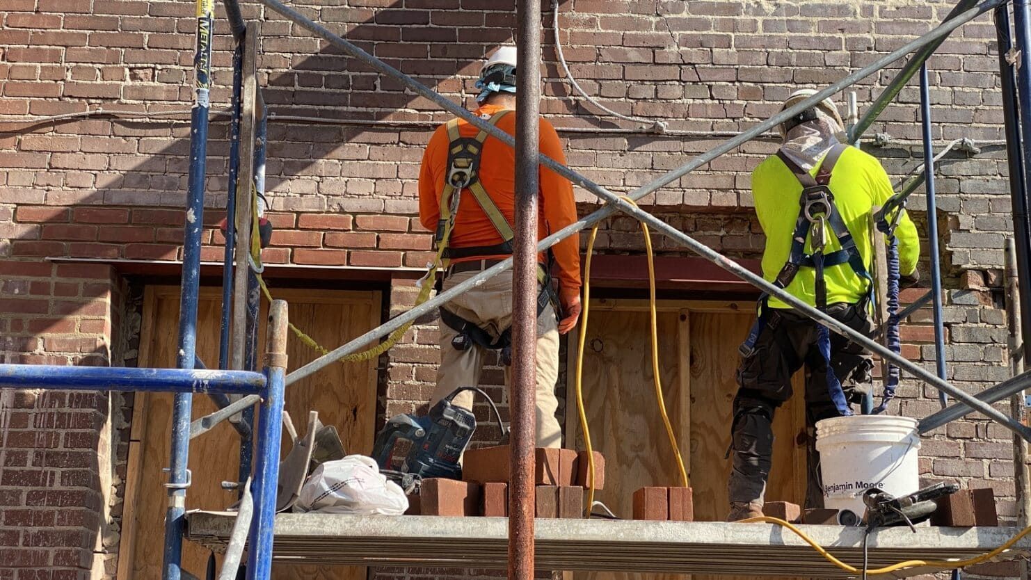 RestoreWorks crew repairing a steel masonry lintel at NuFarm’s facility in Chicago Heights, Illinois, addressing structural concerns caused by water intrusion and rust-related expansion.