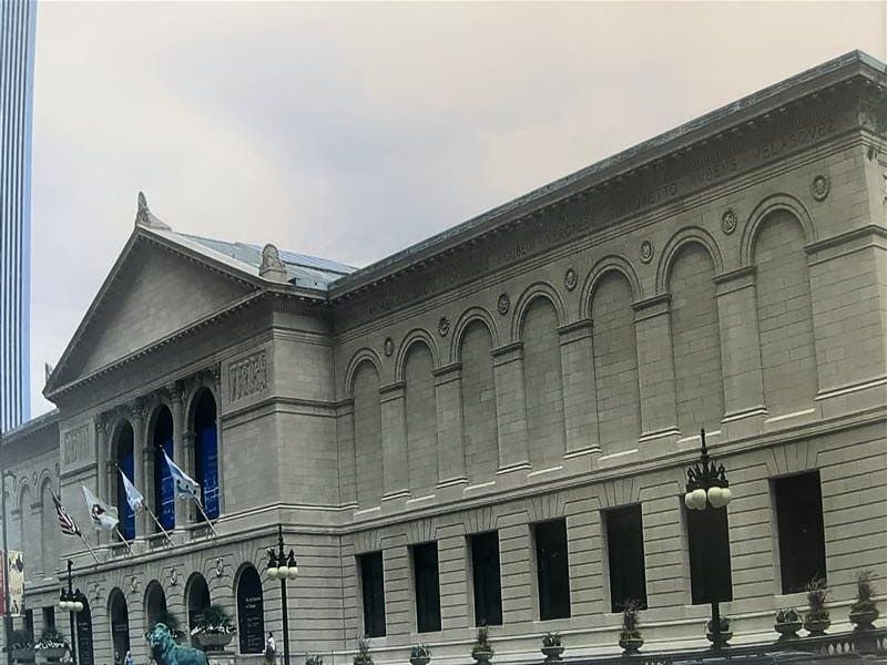 RestoreWorks applying chemical cleaning techniques on stone surfaces at the Art Institute of Chicago to remove pollutants while preserving historic details.