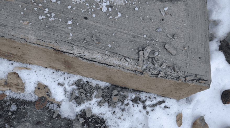 Winter weather exposing hidden masonry damage on masonry and concrete.