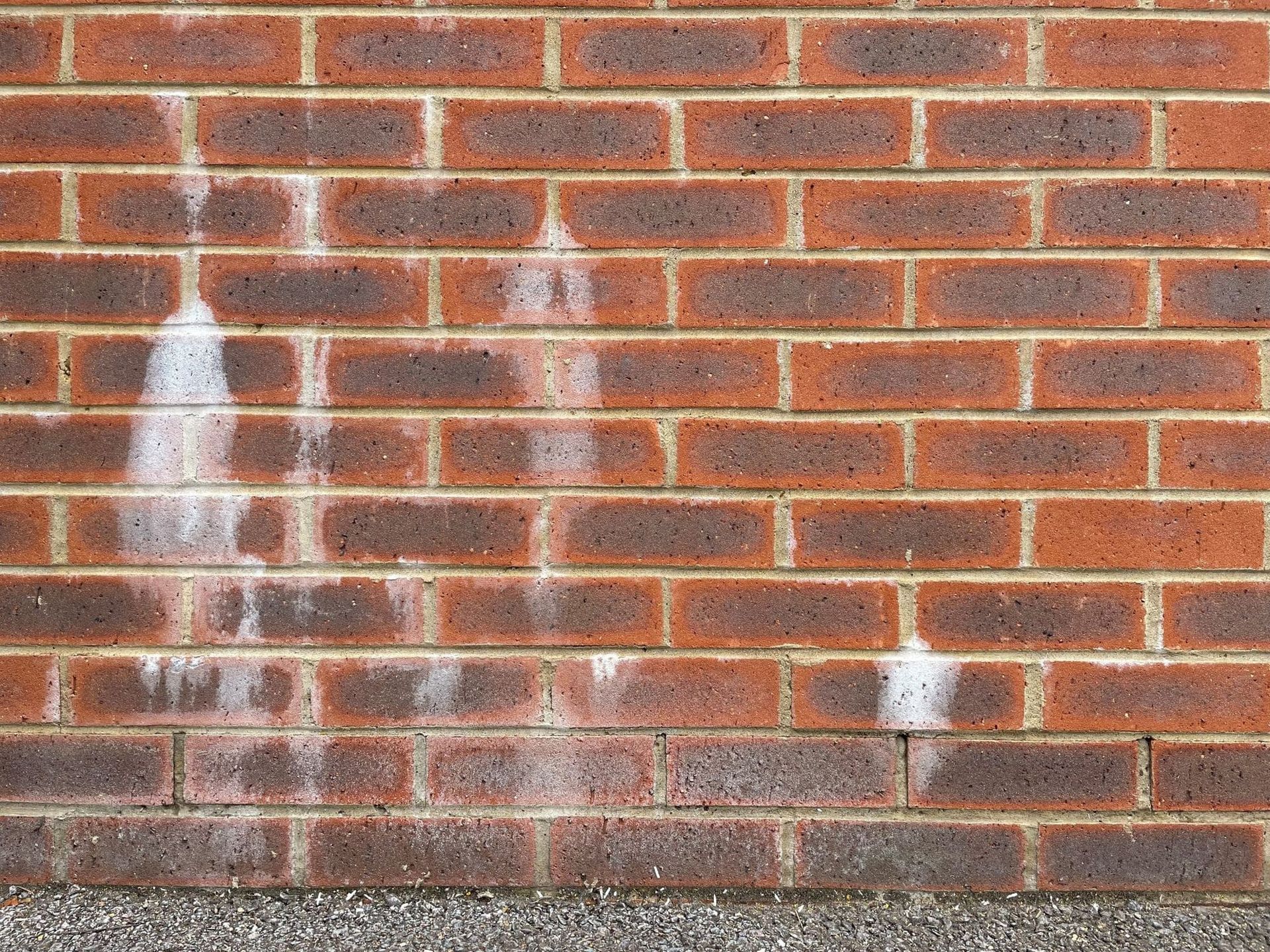 Efflorescence on a brick masonry wall