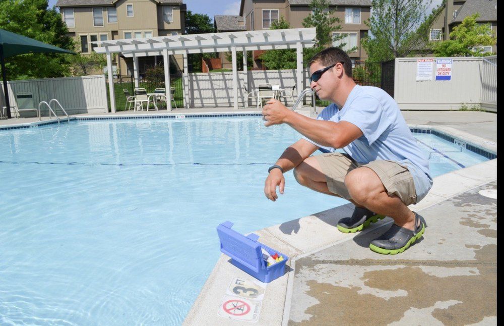 Man Beside the Pool