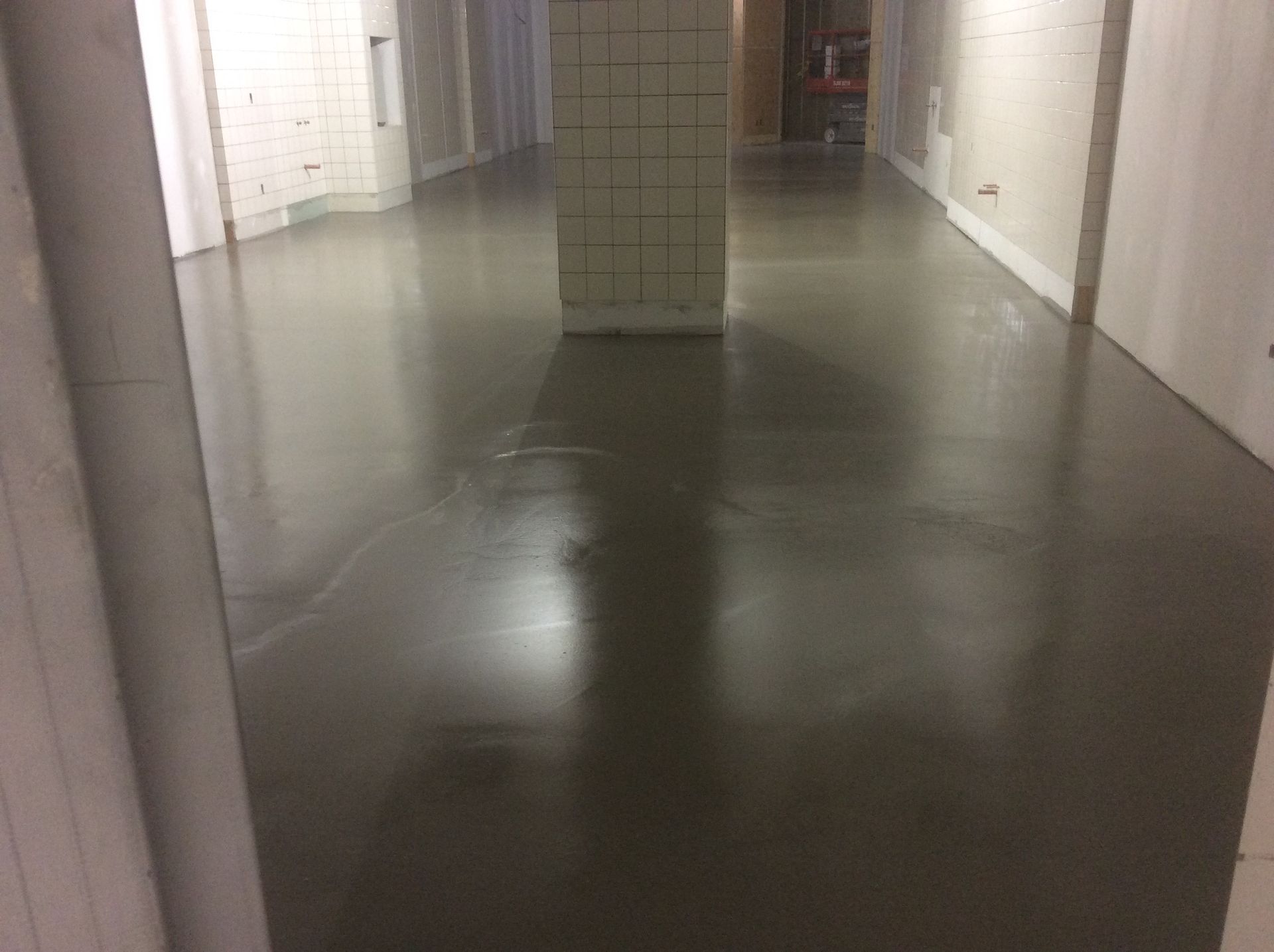 There is a pillar in the middle of the hallway.