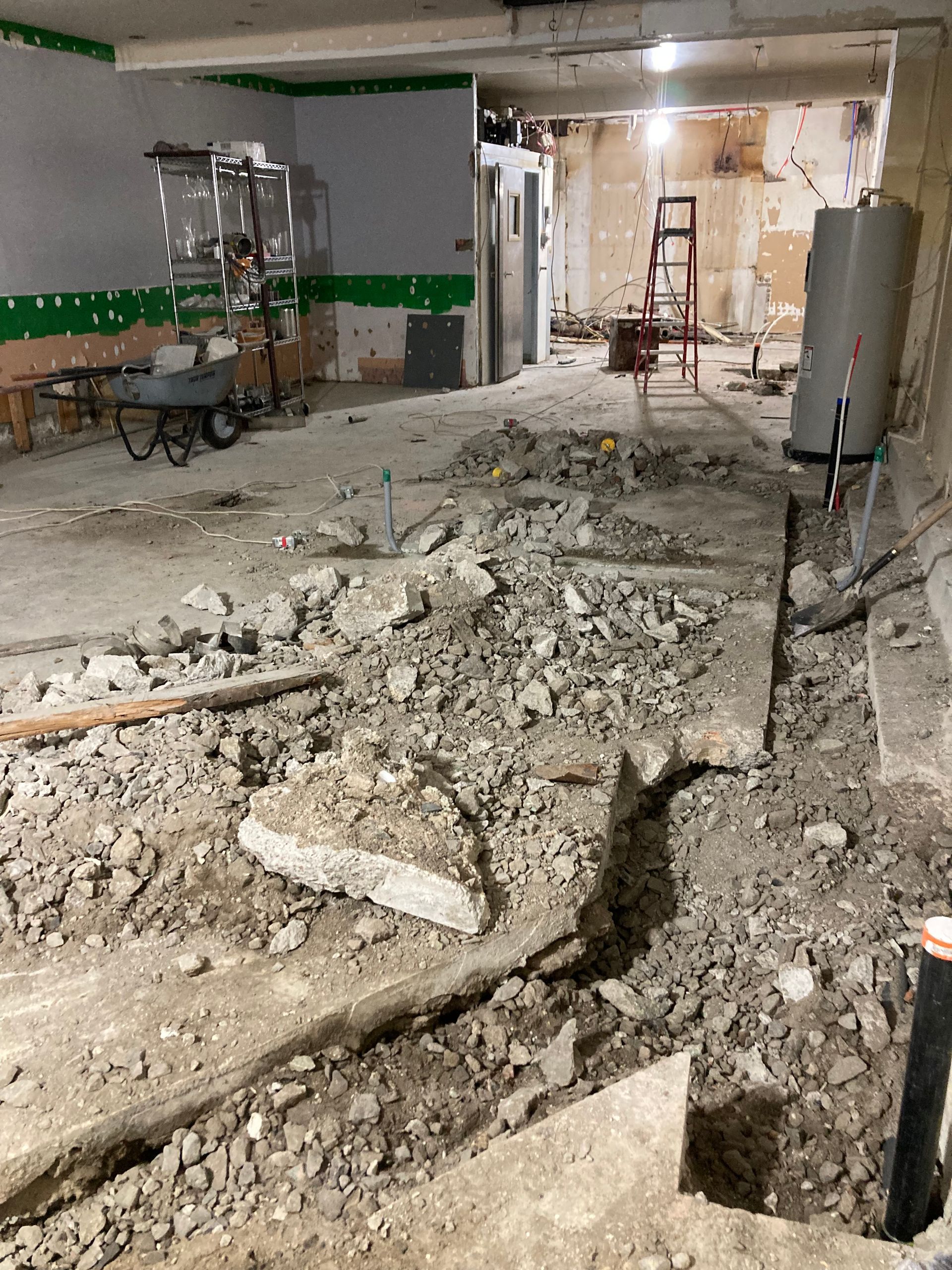 There is a wheelbarrow in the middle of the room.