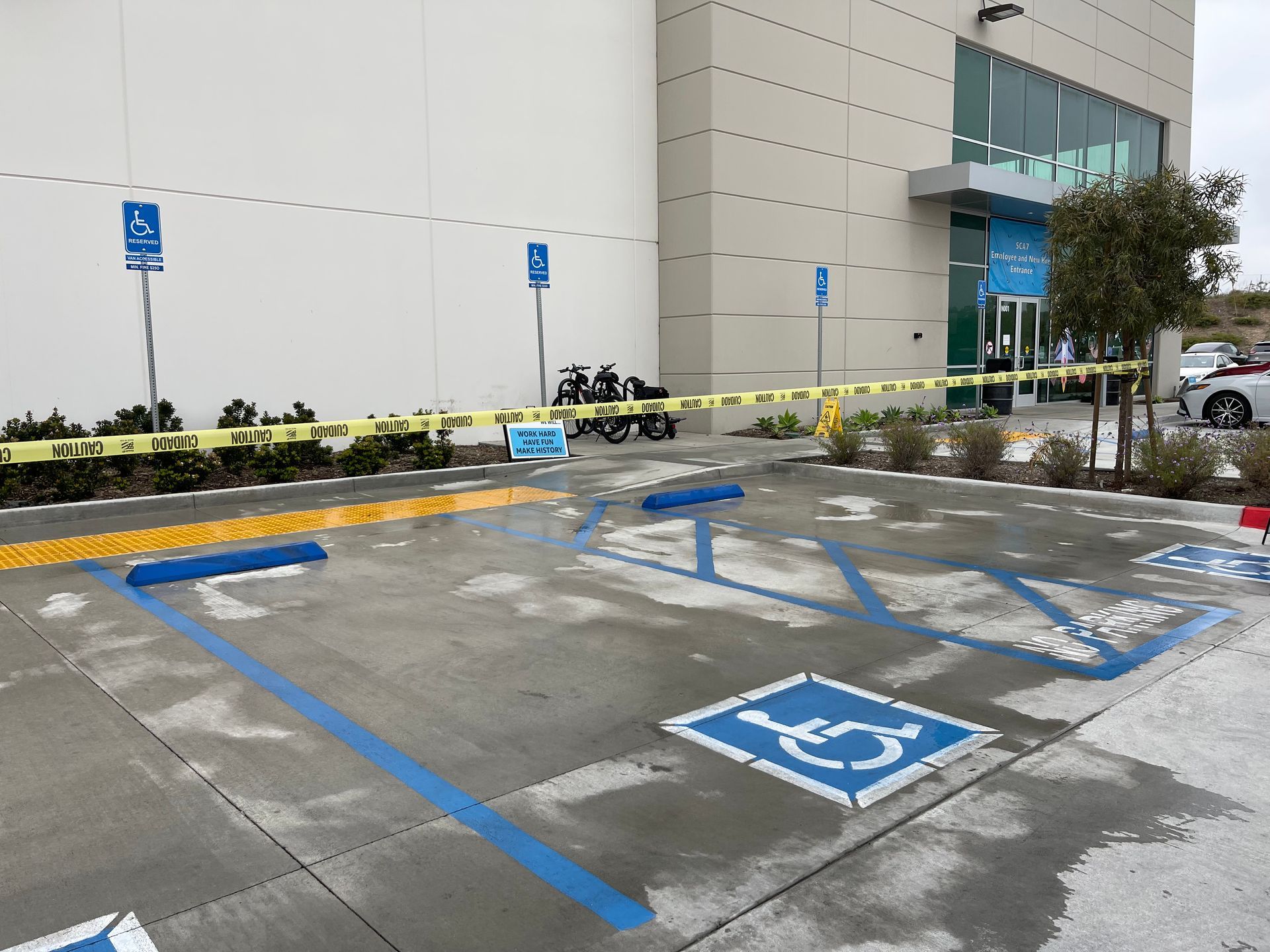 A handicapped parking spot in front of a building