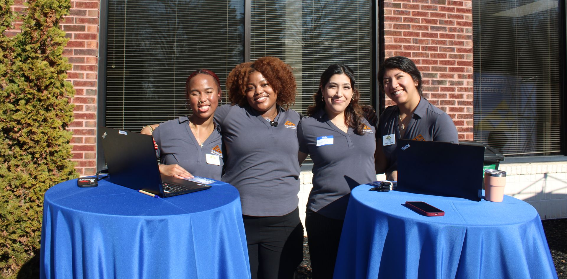 Darrell Tennie, CEO of The Tennie Group LLC, shaking hands with a supporter at the Campaign Kickoff for North Carolina Representative, James Roberson, hosted by The Tennie Group at the main corporate office in Knightdale, North Carolina