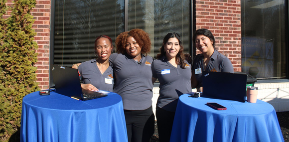  Darrell Tennie, CEO of The Tennie Group LLC, shaking hands with a supporter at the Campaign Kickoff for North Carolina Representative, James Roberson, hosted by The Tennie Group at the main corporate office in Knightdale, North Carolina