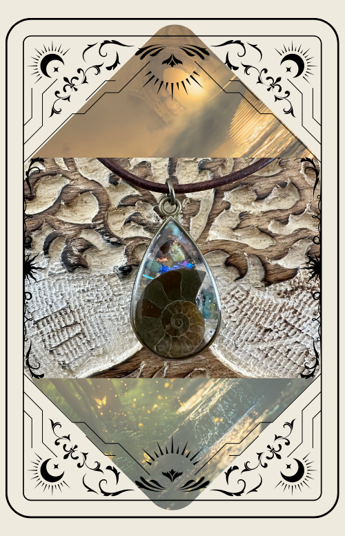 Tarot card with a pendant necklace. Brown leather cord, teardrop pendant with fossil set against a carved background.