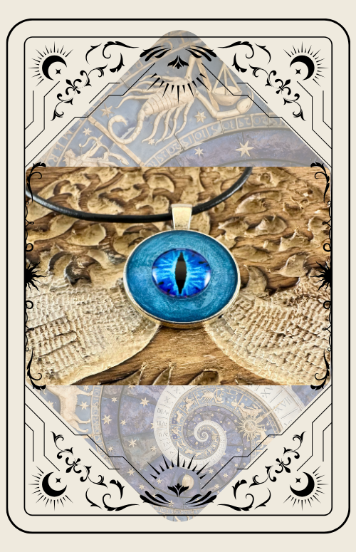 Blue eye pendant necklace on a wooden background with ornate cream-colored border.