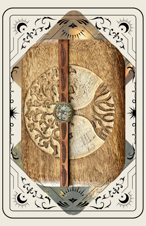 Decorative tarot card with ornate border and central image of a jeweled leather cuff bracelet.
