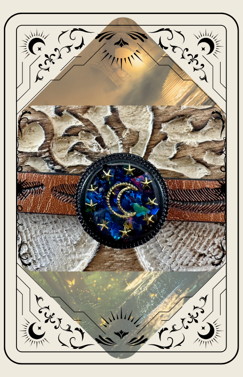 Tarot card design. Round pendant with crescent moon and stars, layered on textured backdrop.