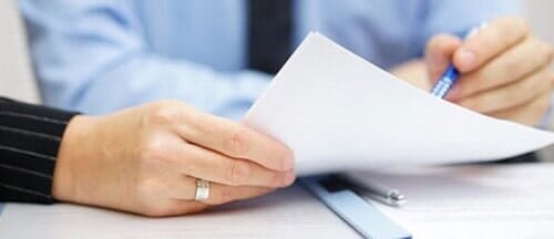 Hands Holding Papers — Experienced Accident Lawyers  in Wheeling, WV