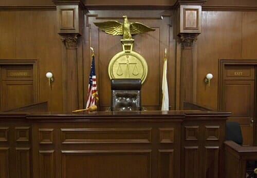 Legal scales behind judges chair — Accident Law Office  in Wheeling, WV