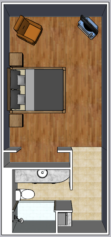 An aerial view of a bedroom with a bed , chair , television , and bathroom.