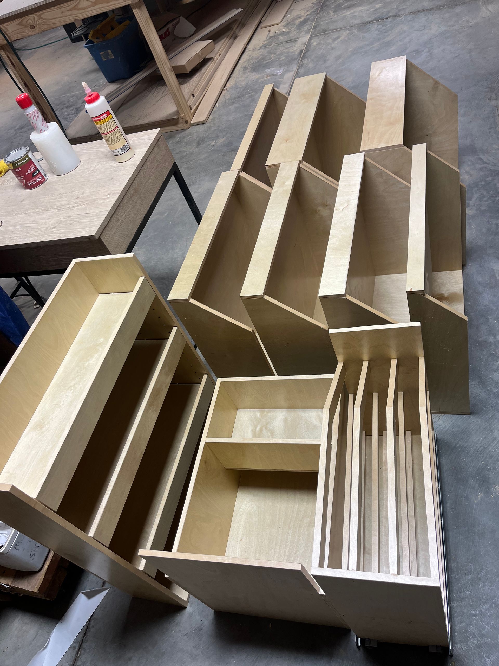 A bunch of wooden boxes are stacked on top of each other