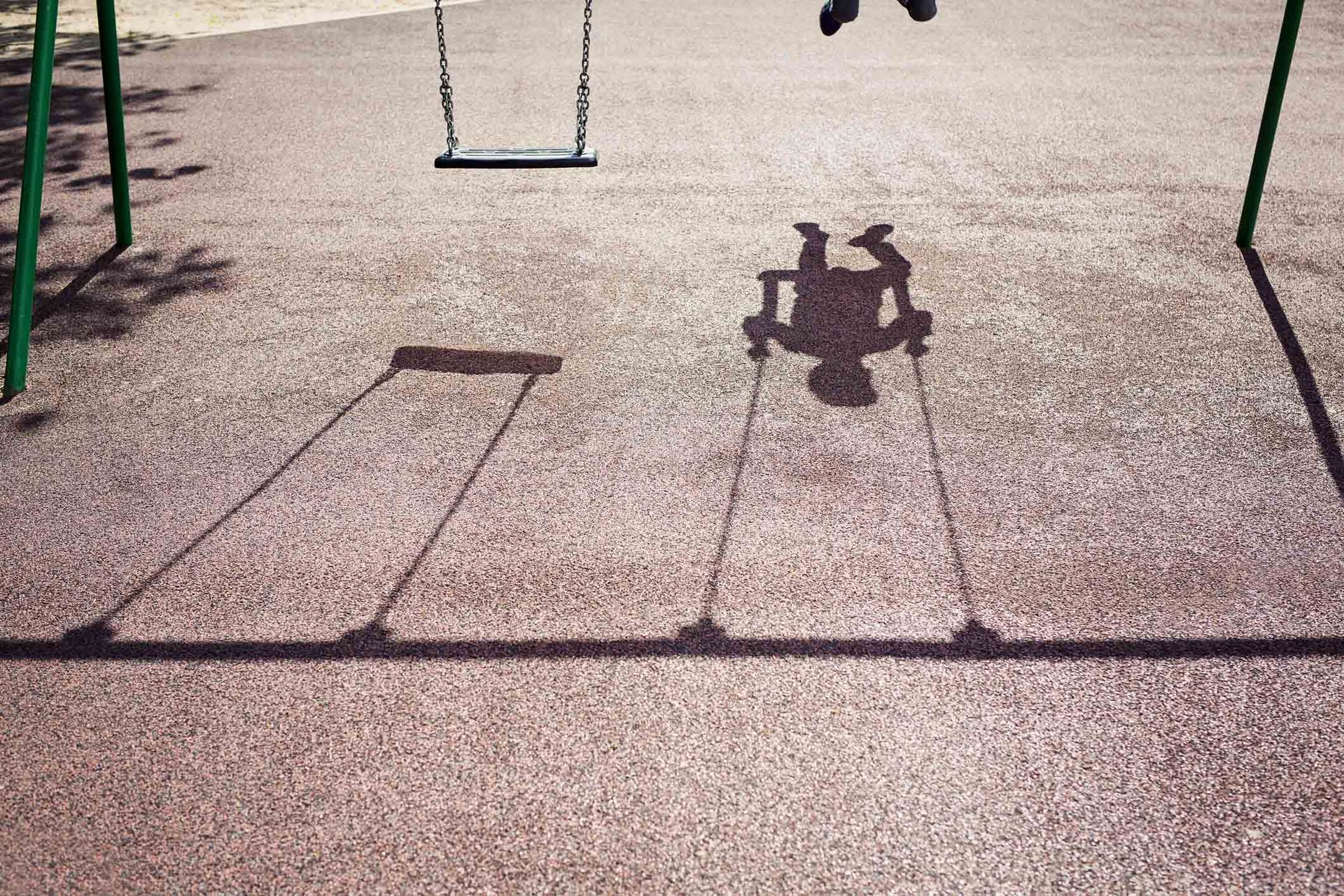 Shadow Of A Child On A Playground Swing — Mt. Holly, NJ — Gcapital Handyman Services LLC