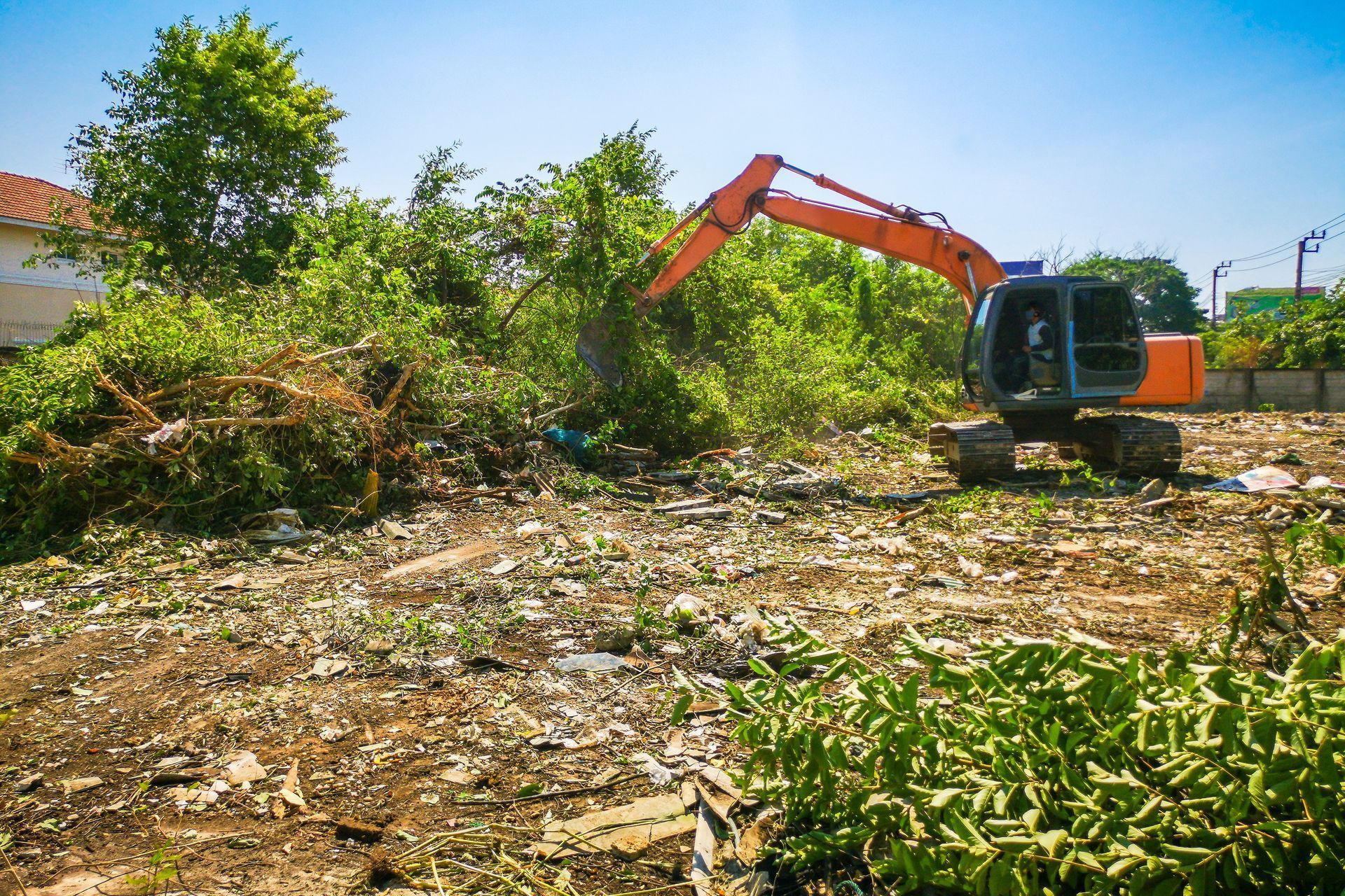 Large Excavator Is Working on A Dirt Field