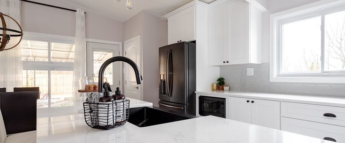 The kitchen in Ambler, PA, has newly painted walls, ceiling, doors, and door frames, creating a clean and refreshed appearance.