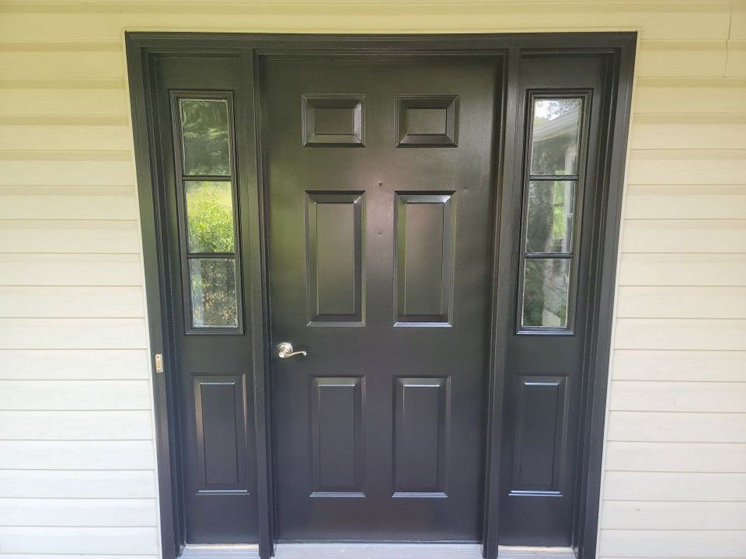 Finished front door. Two coats of paint. Sidelights and door.