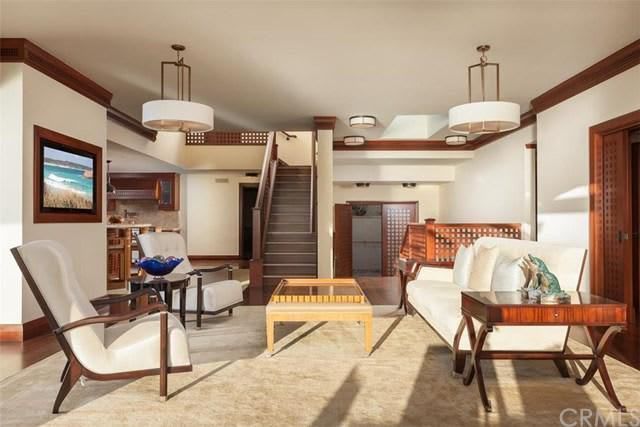 An artist 's impression of a living room with a couch and chairs.