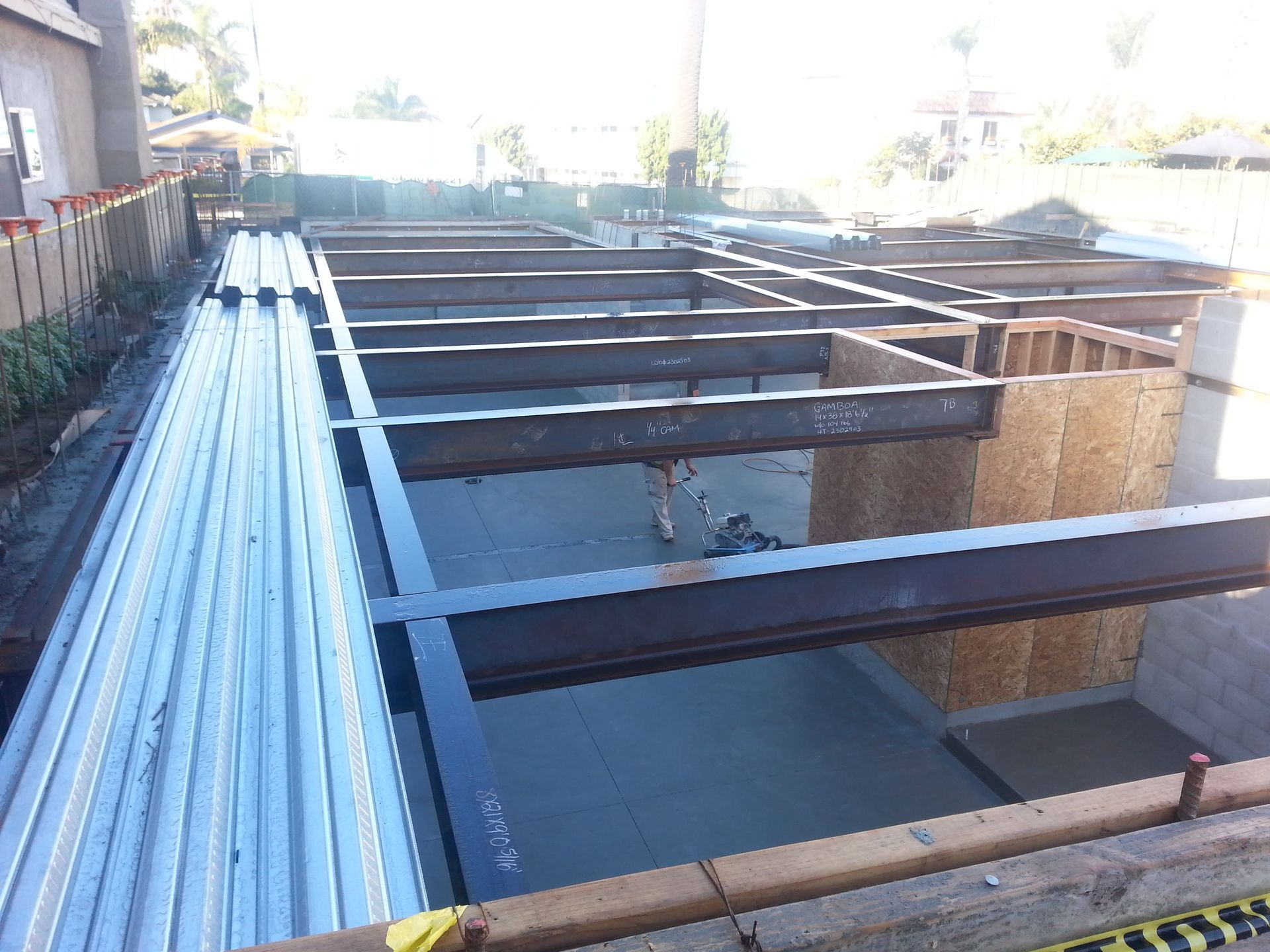 A building under construction with a lot of metal beams.