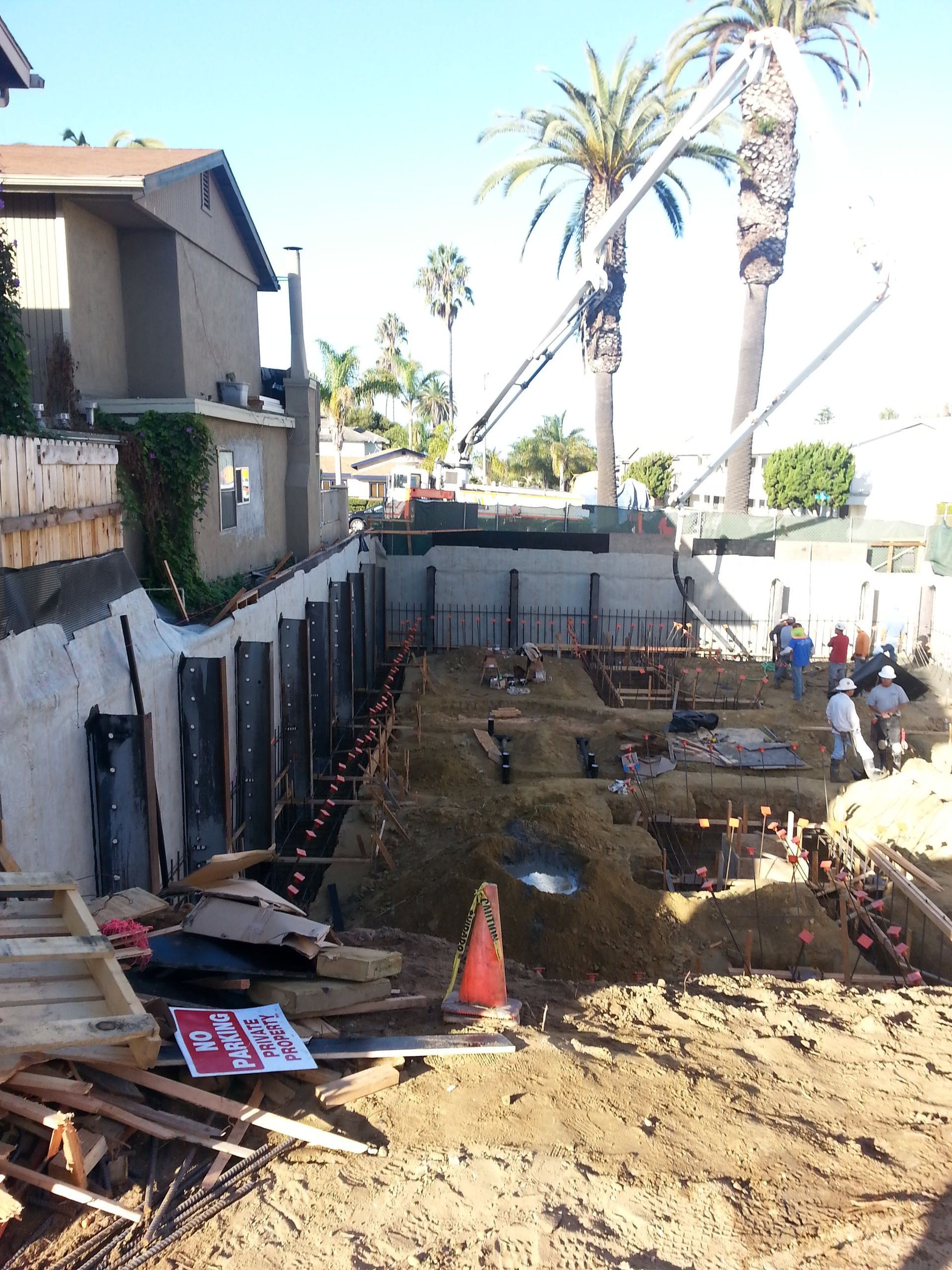 A construction site with a sign that says no parking.