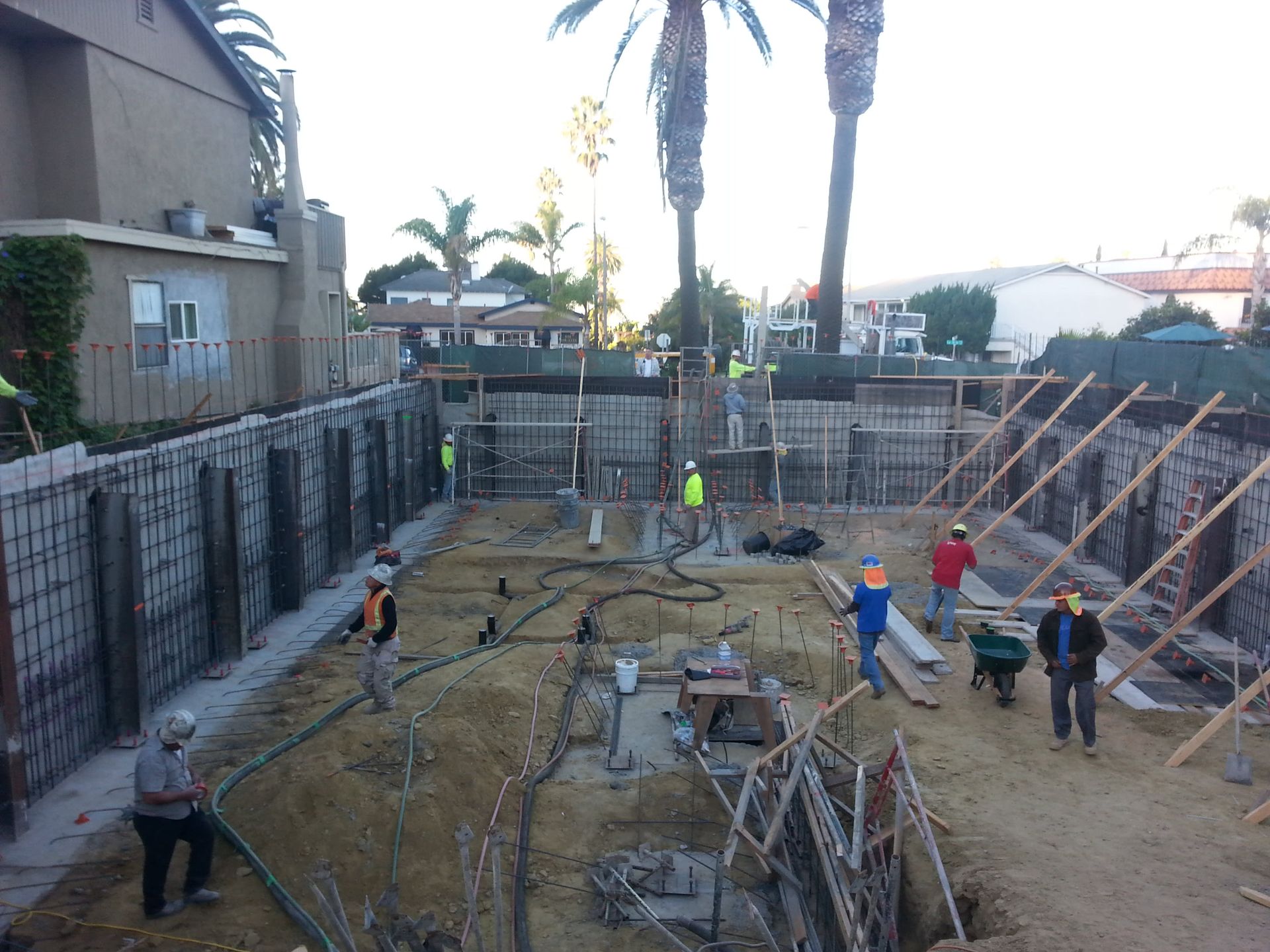 A group of construction workers are working on a construction site.
