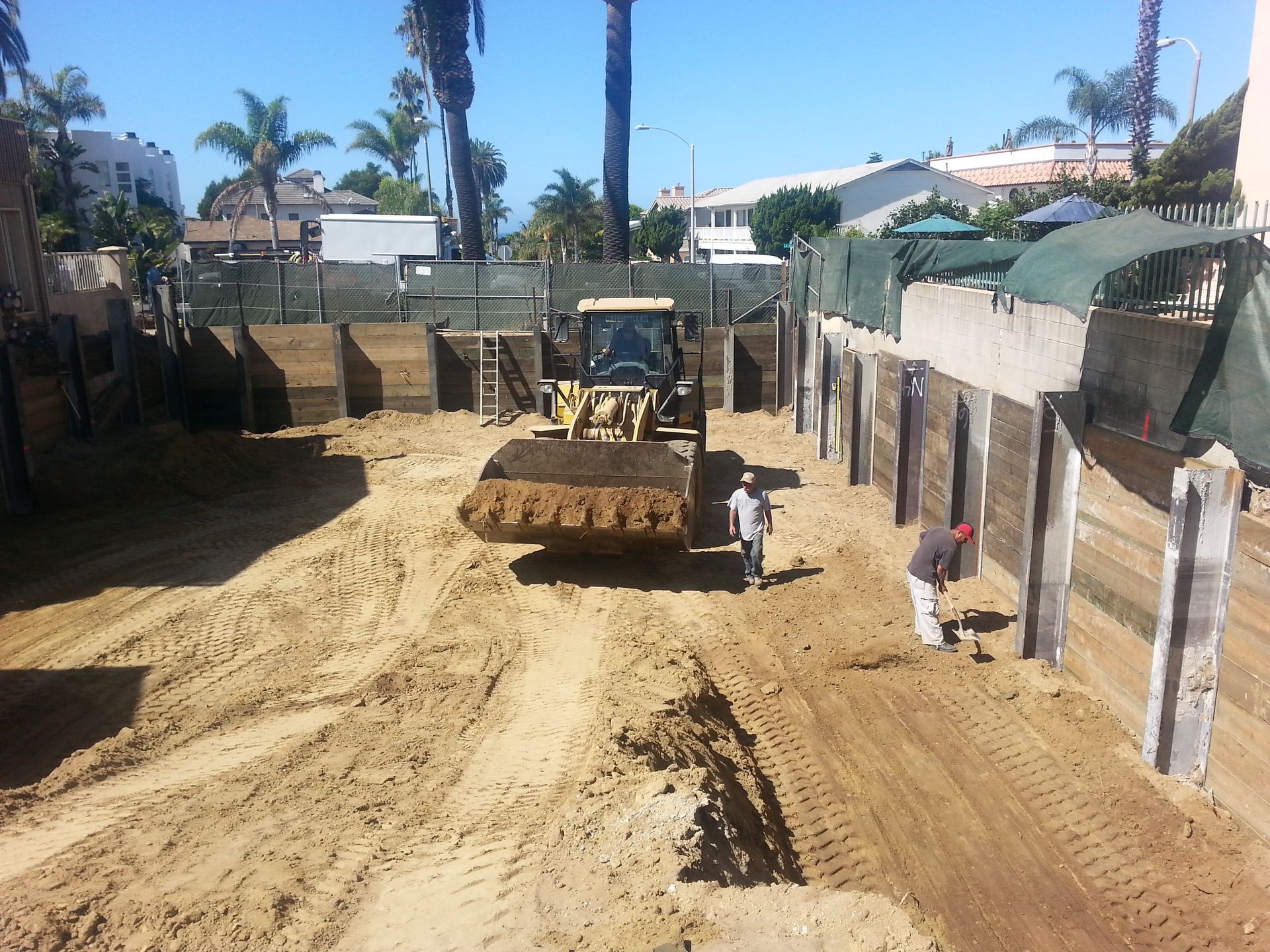 A bulldozer is demolishing a house.